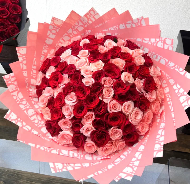 100 Pink and Red Roses on Pink Dir Wrapping