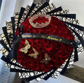100 Red Roses on Black Dir Wrapping