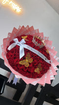100 Red Roses on Pink Dir Wrapping