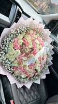 100 Pink And White Roses Baby Breath on Pink Transparent Wrappin